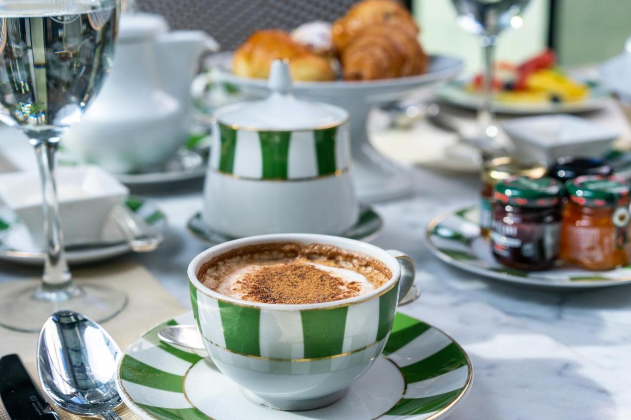 Alvear Icon Hotel Buenos Aires Extérieur photo A cup of cappuccino