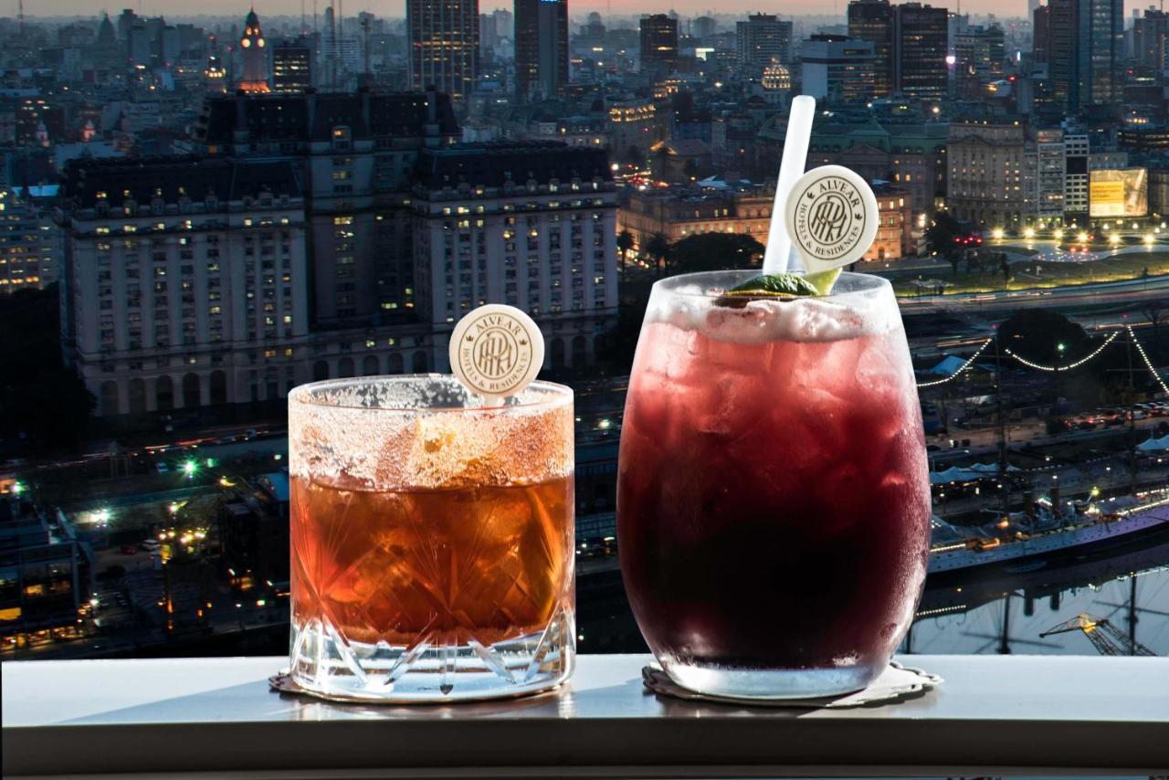 Alvear Icon Hotel Buenos Aires Extérieur photo Two cocktails